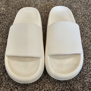 White slip on sandals